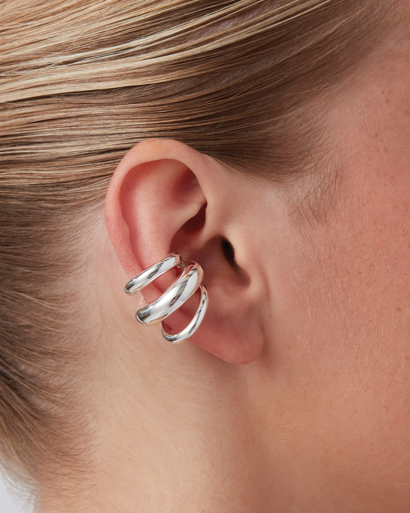 Silver ear cuffs
