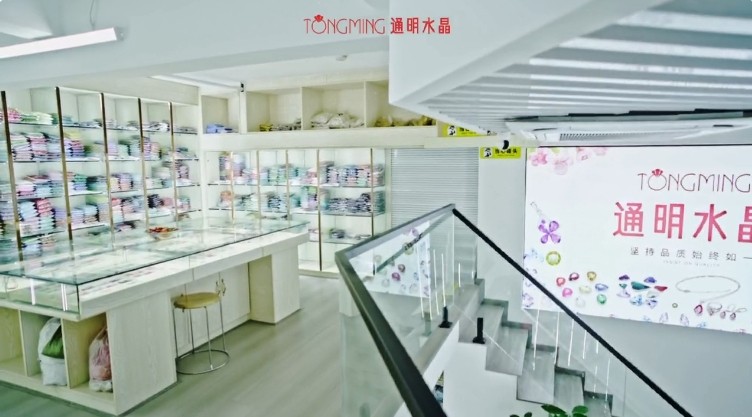 Finished crystal cascade earrings with light catching the AB finish glass drills