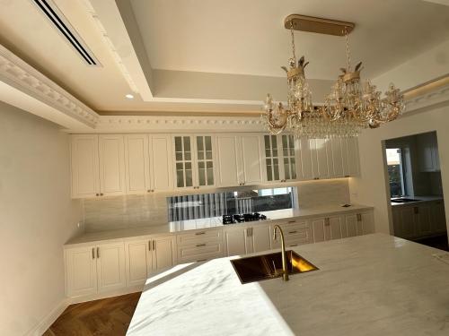 White raised door shape french style kitchen cabinet Melbourne