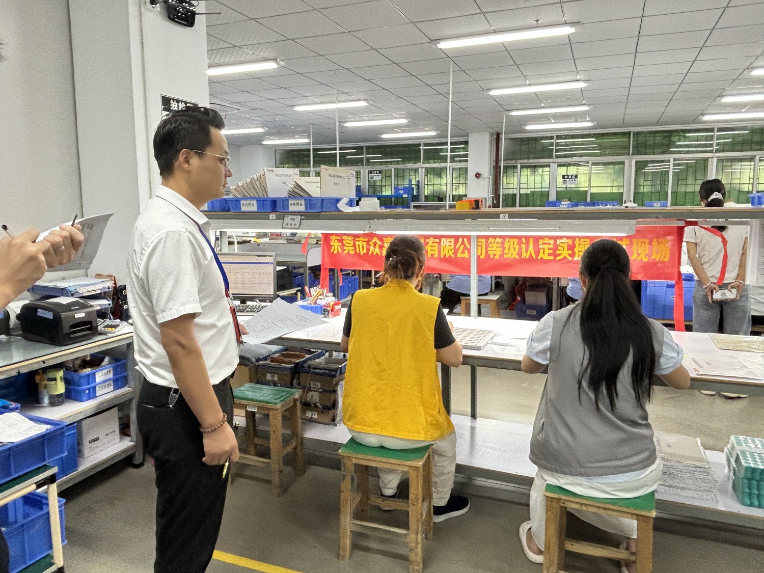 Figure 2: KeyPadOne vocational skill level certification QC practical exam - supervisors score on site while candidates complete the full quality inspection workflow at workshop stations.