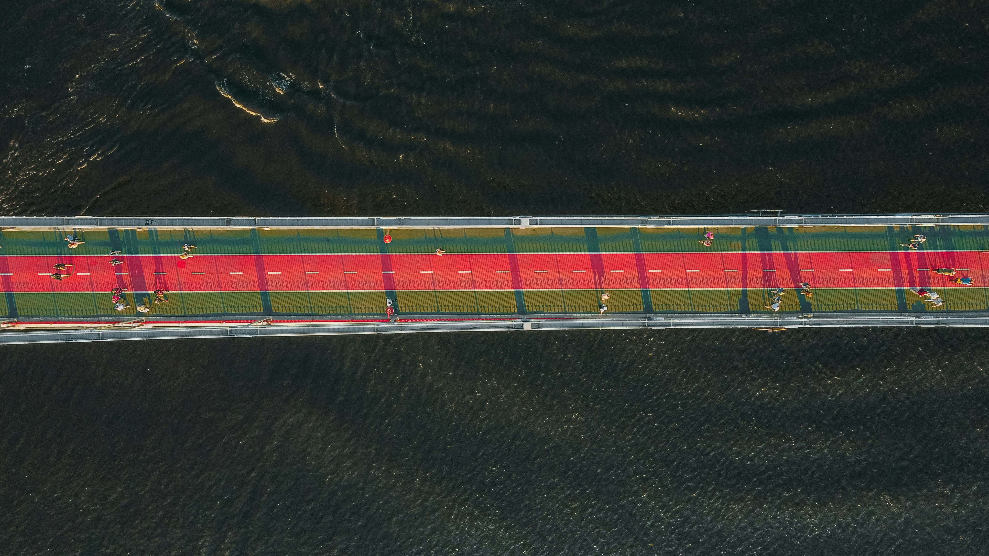 A durable rubber strip being used as a rub rail on the hull of a boat.