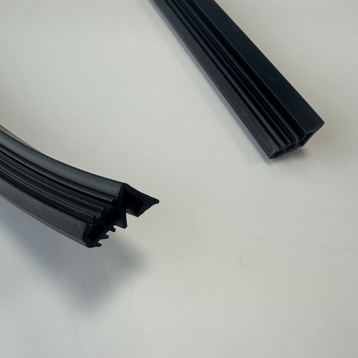 Black rubber door and frame sealing strips