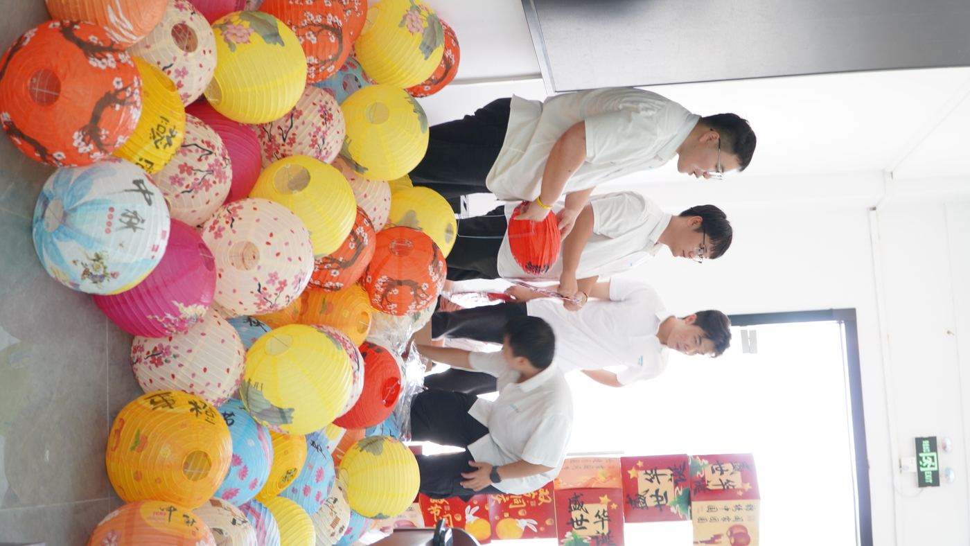 RESRUB employees preparing colorful Mid-Autumn lanterns