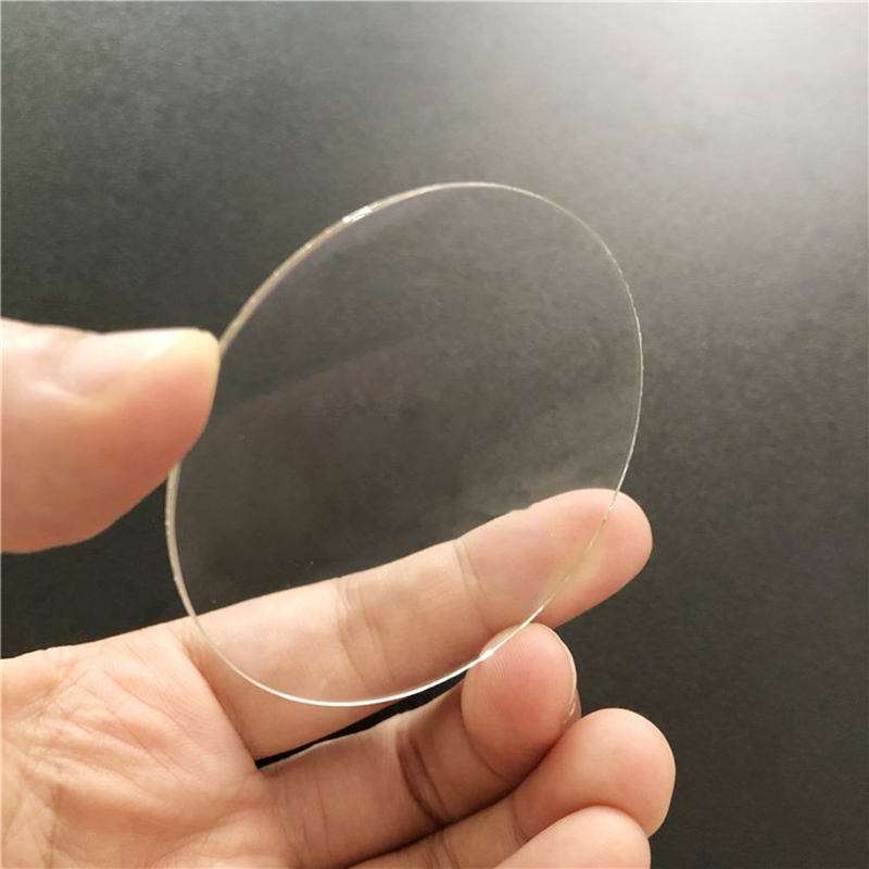custom-shaped ultra-thin sapphire protective cover with polished optical surfaces and machined edges