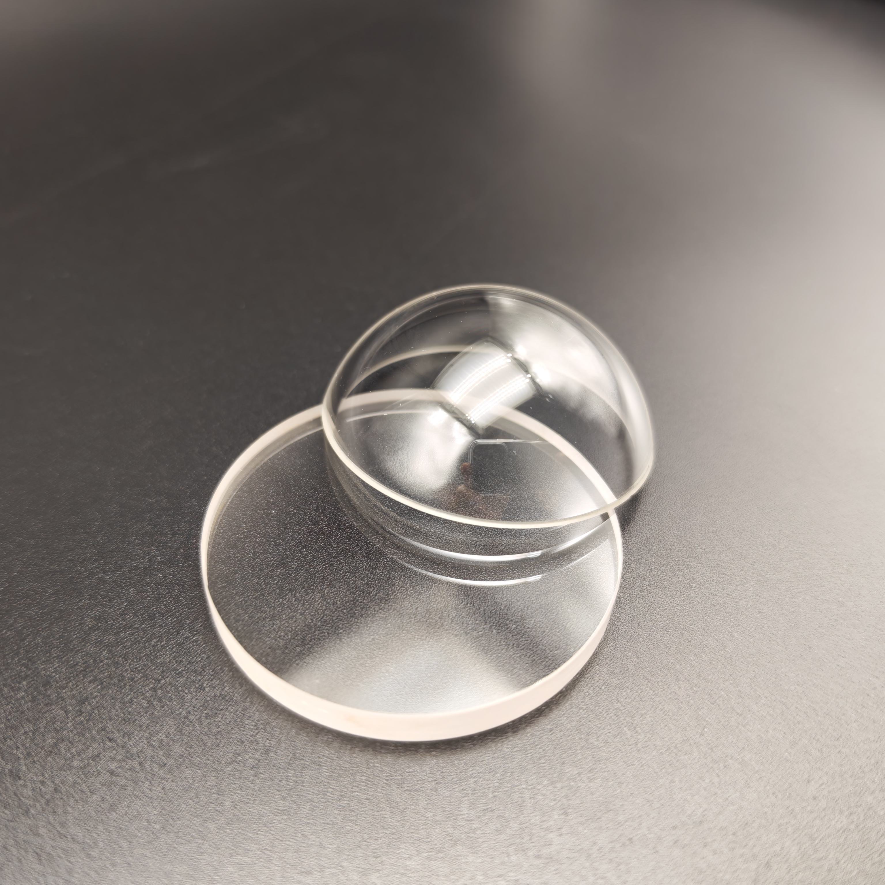 Ultra-polished single crystal sapphire hemispherical dome lens for distortion-free wide-angle underwater ROV detection imaging