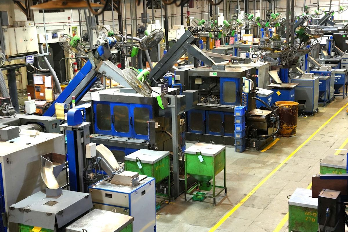 Modern industrial manufacturing floor with precision equipment used for sapphire optical viewport production