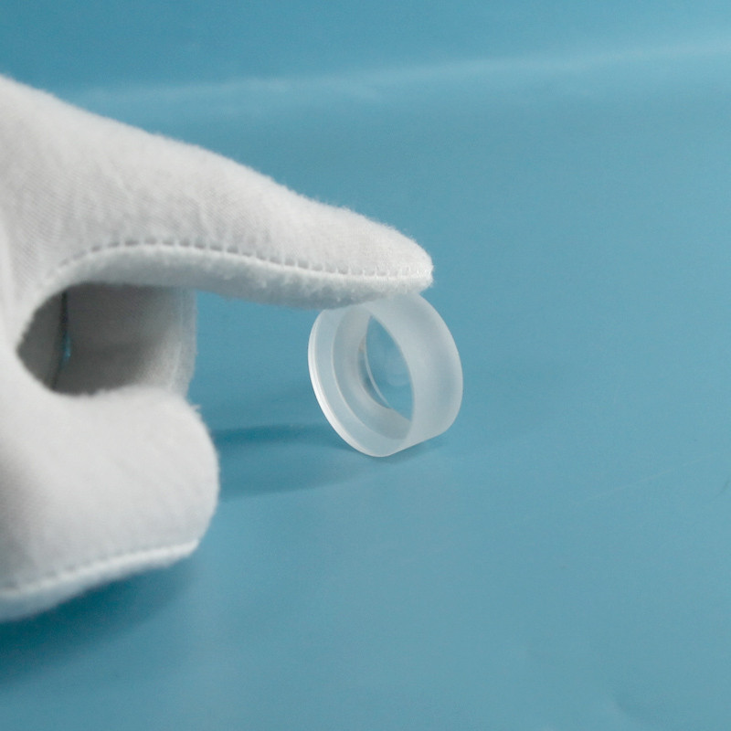 Cleanroom inspection of custom N-BK7 stepped laser lens from Felix Glass