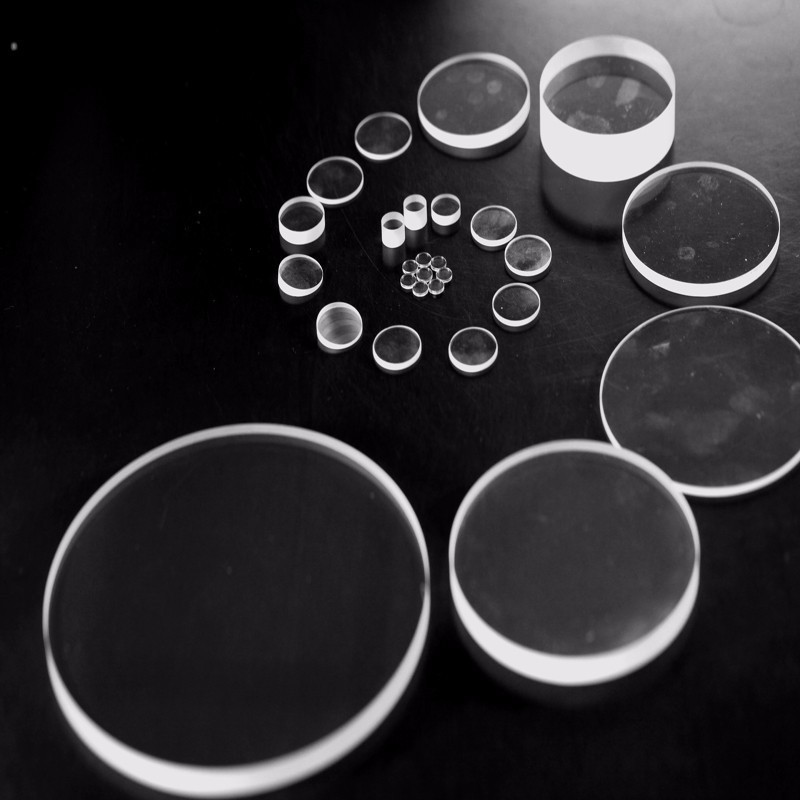Felix Glass optical manufacturing facility with CNC grinding and polishing equipment for precision N-BK7 green laser optics