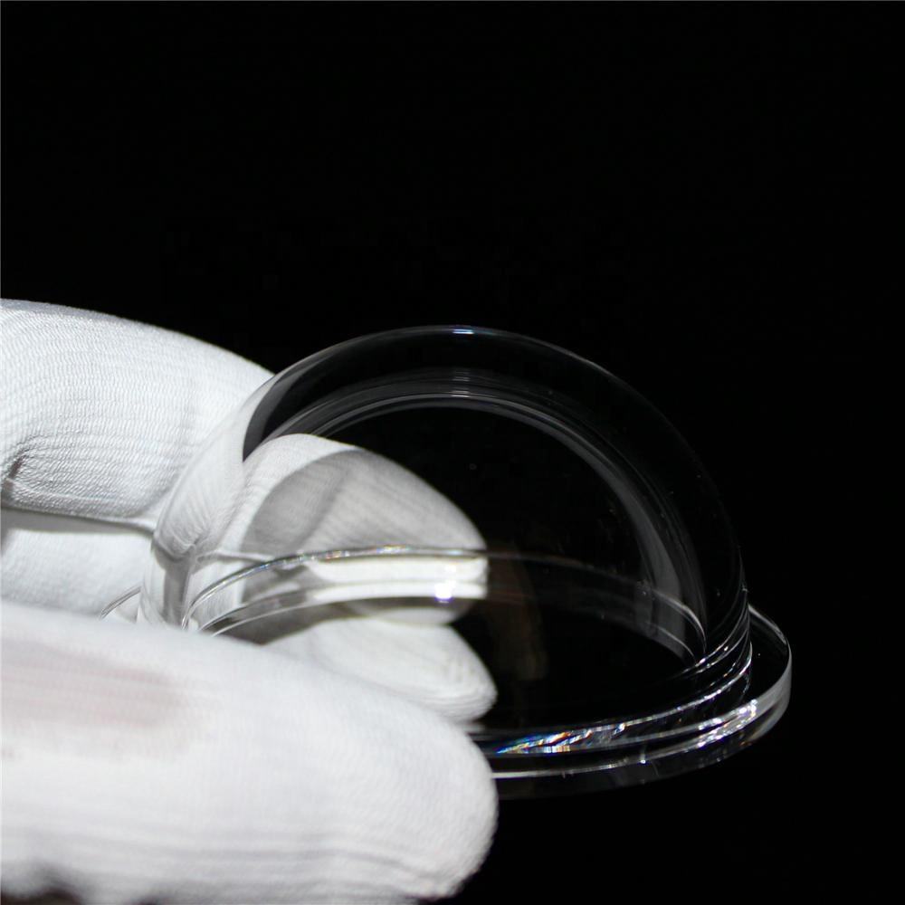 Fused silica dome port held with a glove for optical handling