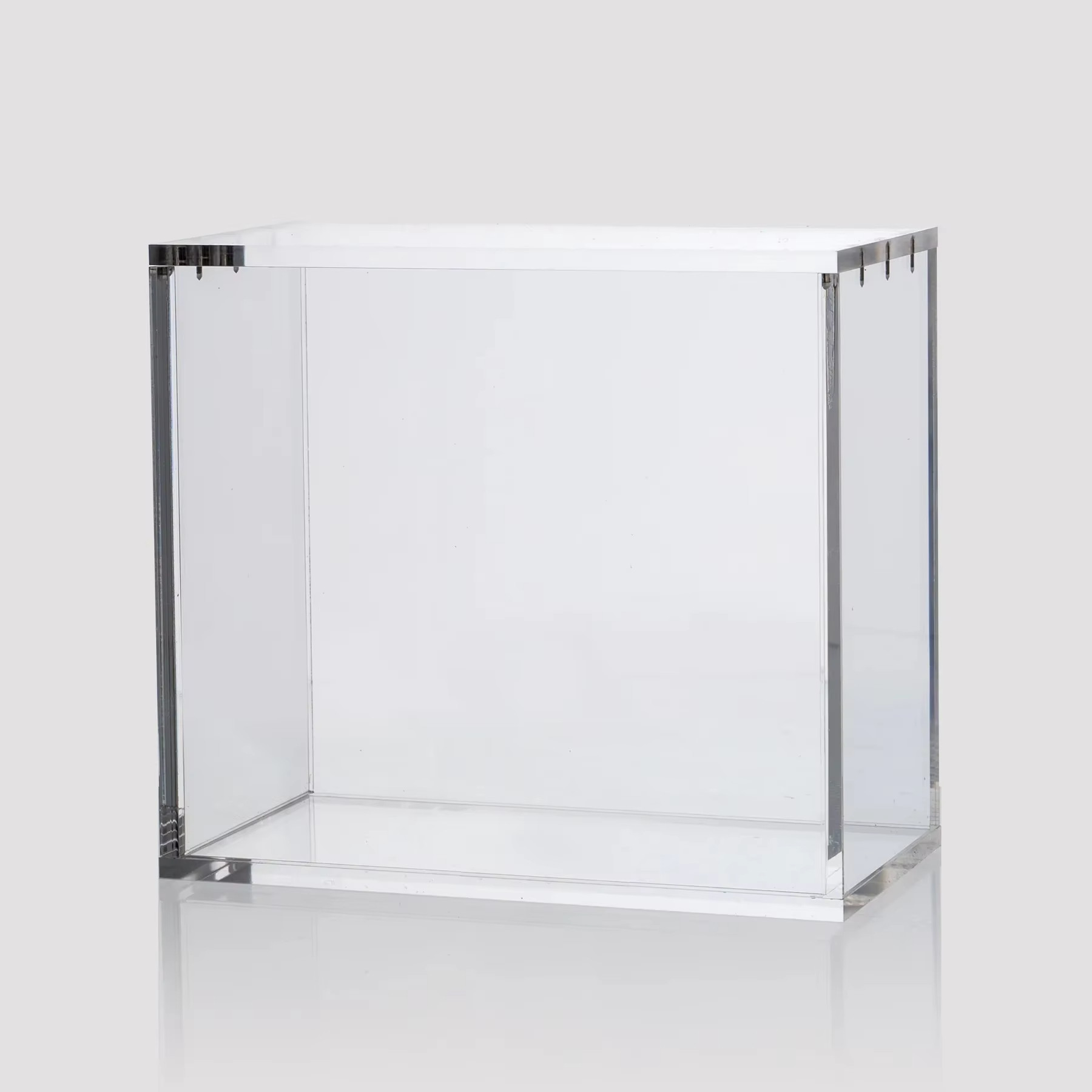 Star Wars Unlimited booster box case — screw-down acrylic display case for a sealed booster box in retail