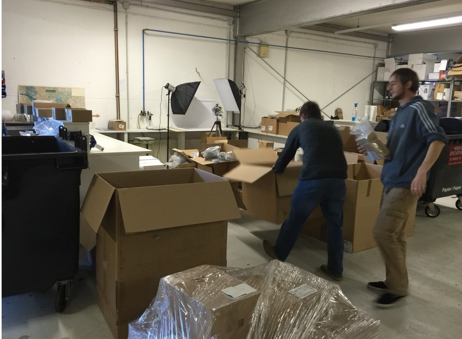 GPP packing area in Bremen with wall map photo studio softboxes and outbound boxes