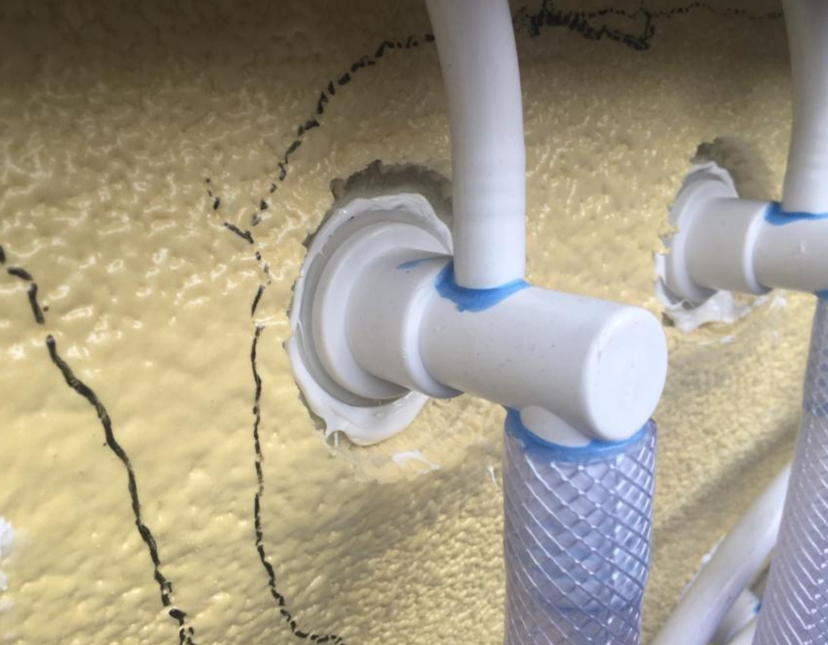 PVC T-junction fitting with blue solvent cement at EEH SPA factory Eastern Europe