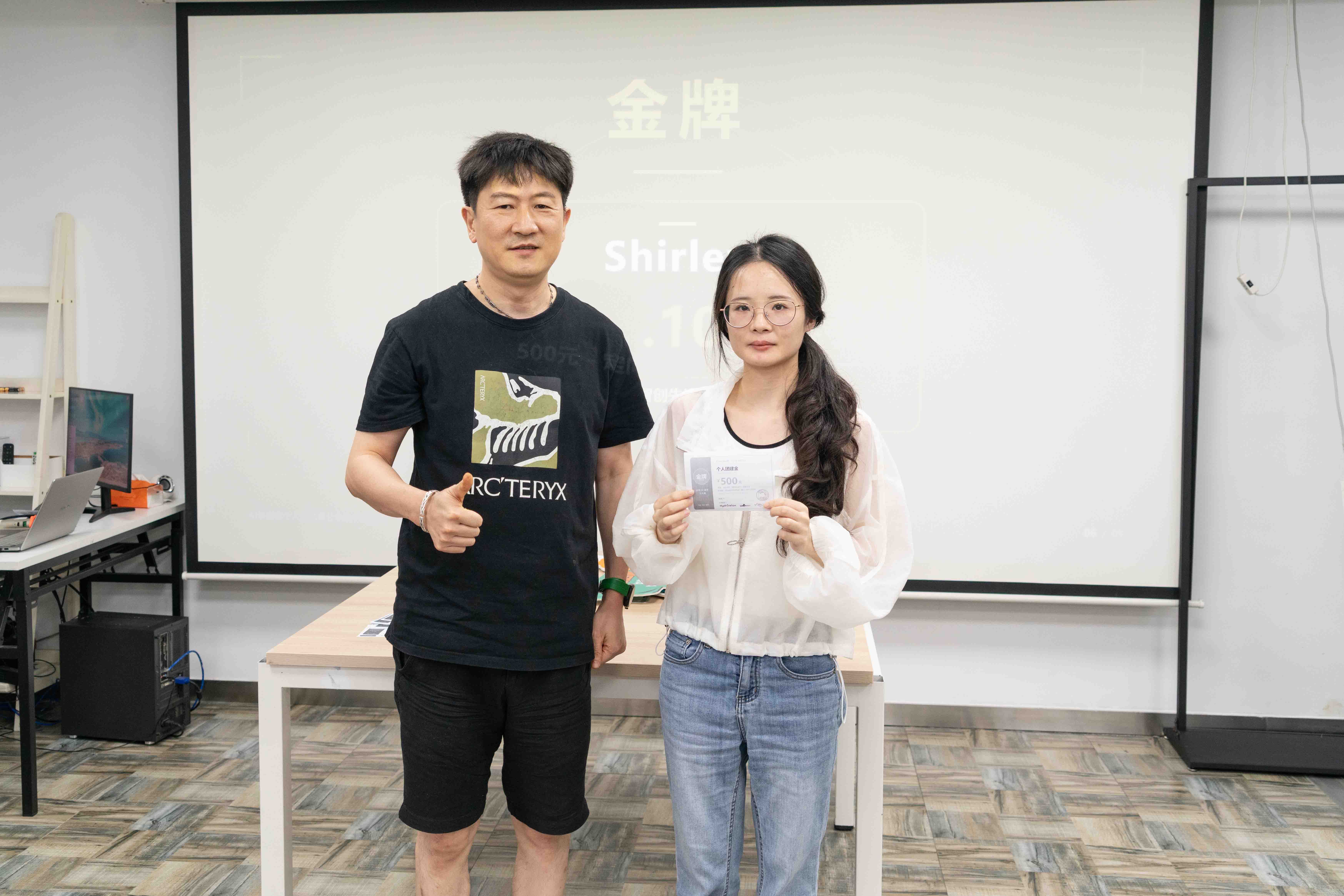 Gold award presentation: Jonny and Shirley (from left to right)