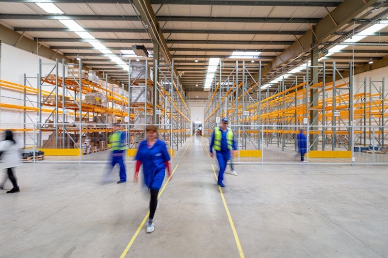 Warehouse logistics with laser positioning warning light