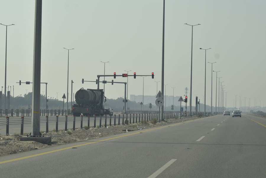 Freight truck travelling through highway traffic