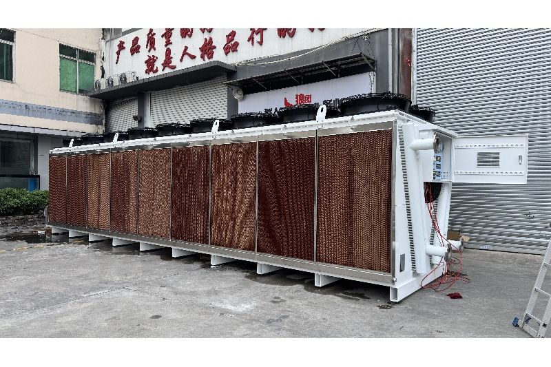 V-type dry cooler with wet pads for adiabatic air cooling