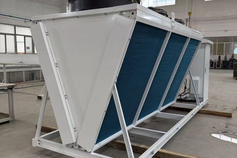 Adiabatic dry cooler with wet pad pre-cooling system