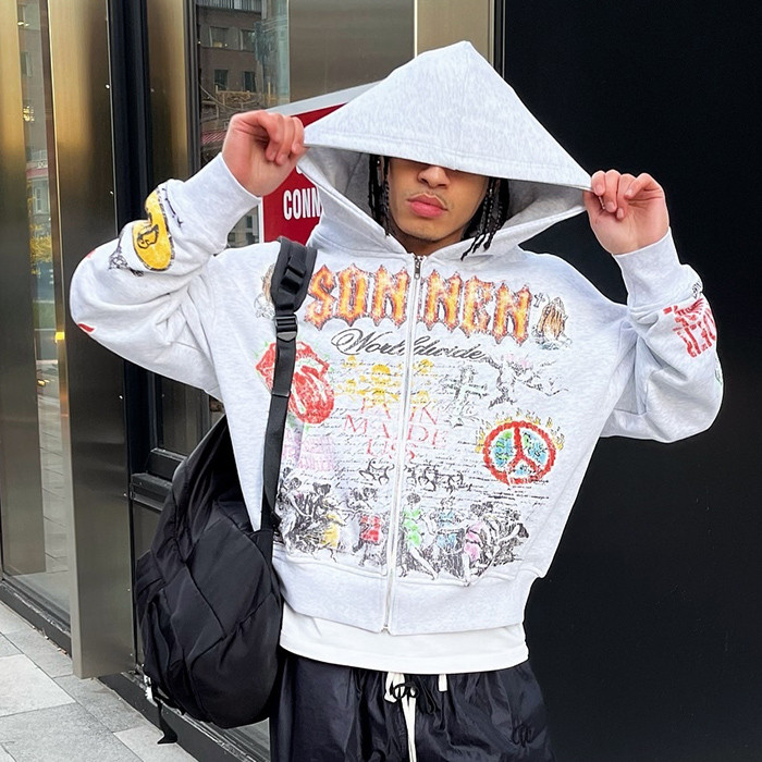 Close-up of high quality DTG print with vintage crackle effect on a heavyweight custom hoodie, made in China