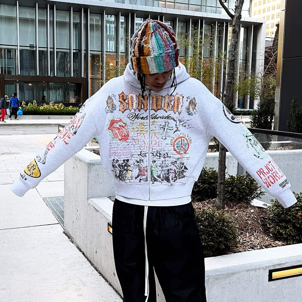 Oversized cotton hoodie featuring distressed artwork and kangaroo pocket, designed by leading Dongguan hoodie manufacturer