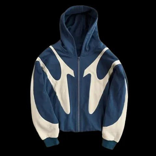 Model wearing white rhinestone zip up hoodie with vintage artwork, manufactured by leading hoodie manufacturers in China for upscale fashion brands