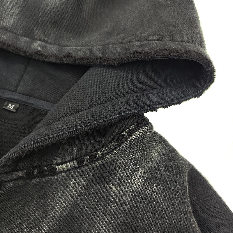 Distressed streetwear hoodie featuring cracked edges and graffiti logos by Groovecolor, hoodie supplier for US brands