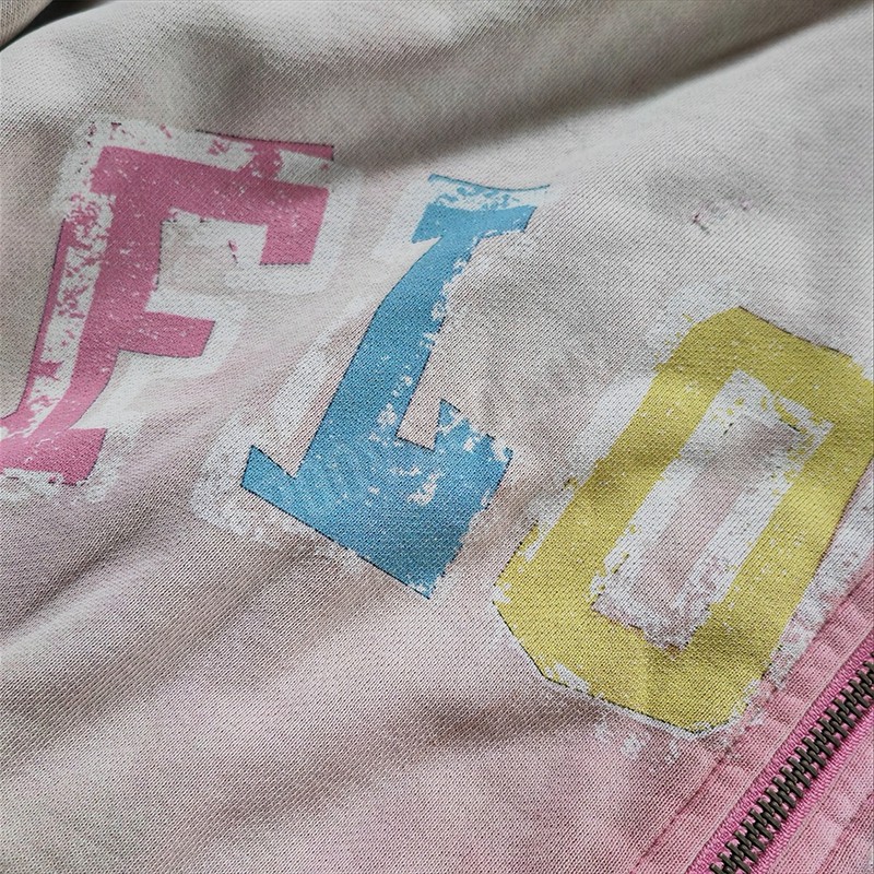 Double-layer hood in cream and pink on Groovecolor custom acid wash hoodie, oversized streetwear piece for London and Berlin labels.