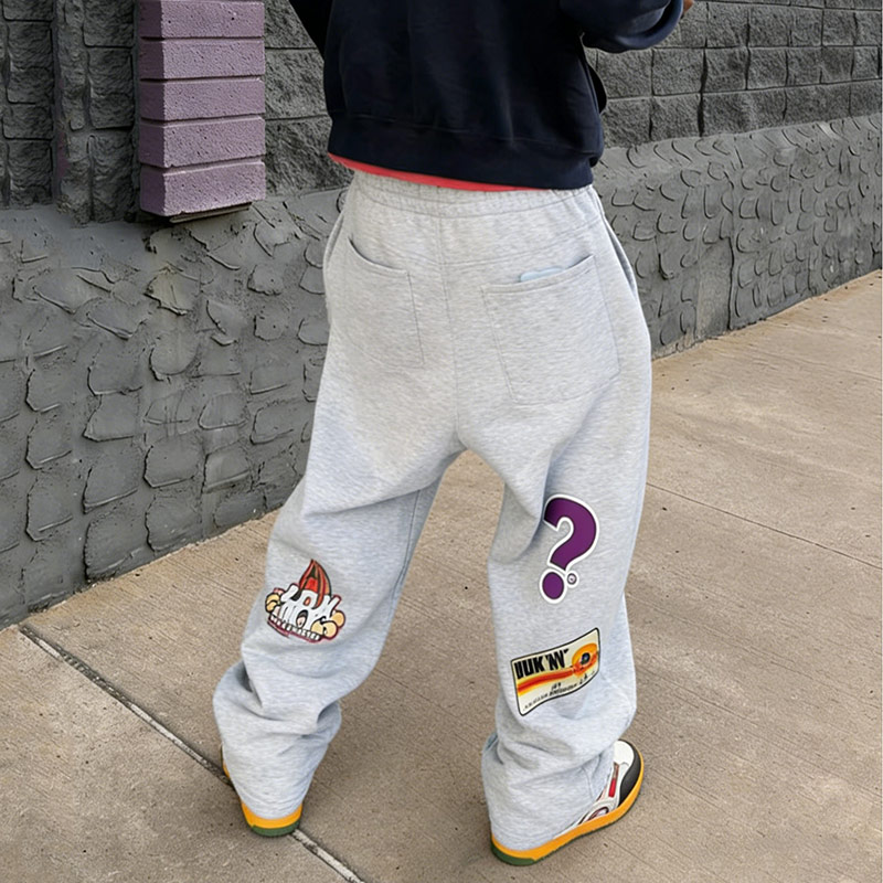 Premium streetwear sweatpants manufacturing facility showcasing high-quality production processes