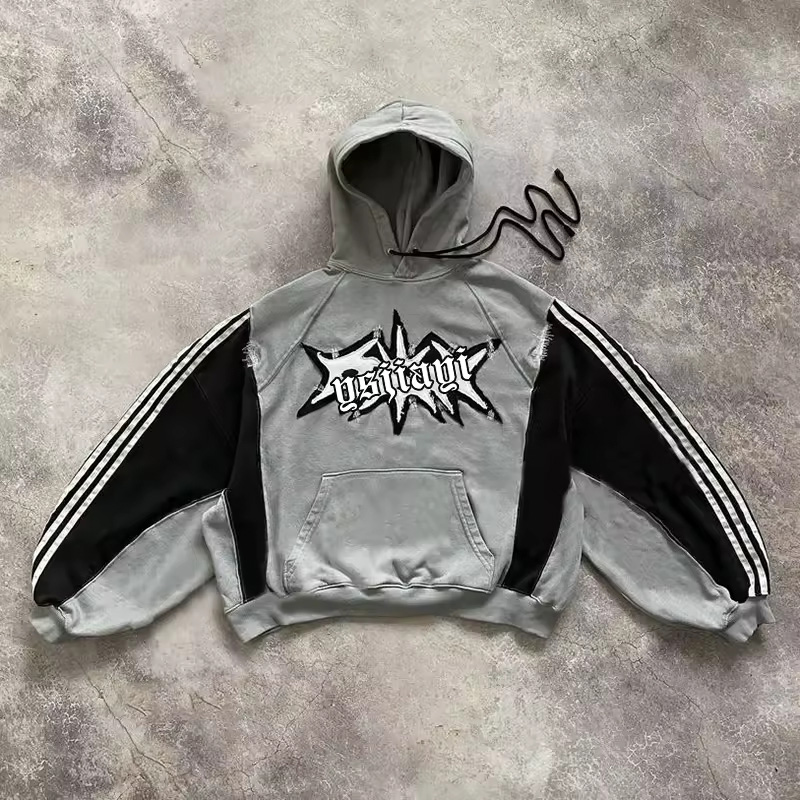 A detailed shot of a 400 GSM heavyweight cotton french terry fabric, highlighting the dense knit structure for premium streetwear hoodies.