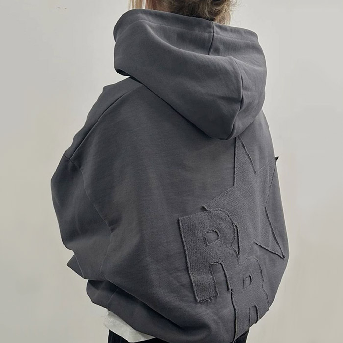 Custom embroidered hoodies manufacturing with heavyweight fleece, stitch density control, and vintage wash testing