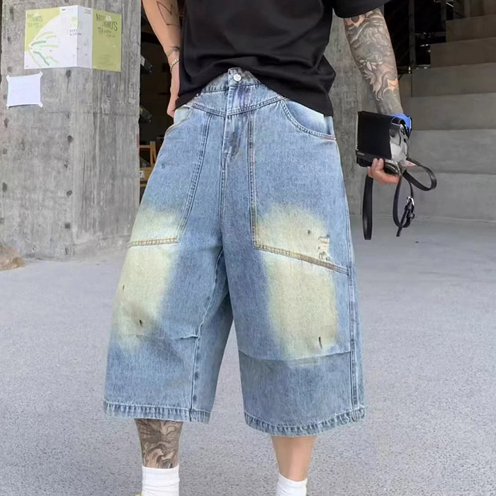 Baggy jorts manufacturing with denim wash development, relaxed pattern engineering, and bulk production control for streetwear brands