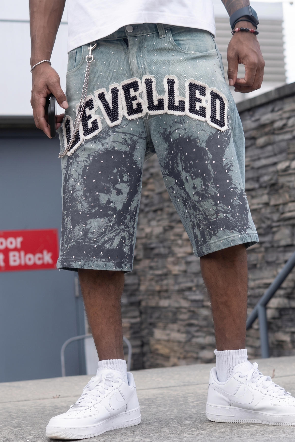 Front middle applique embroidery on premium custom denim shorts by Groovecolor
