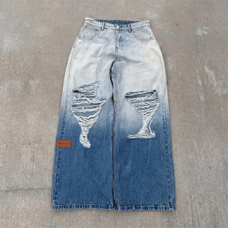 Light to dark blue gradient wash denim jeans featuring custom cut and sew manufacturing by Groovecolor.