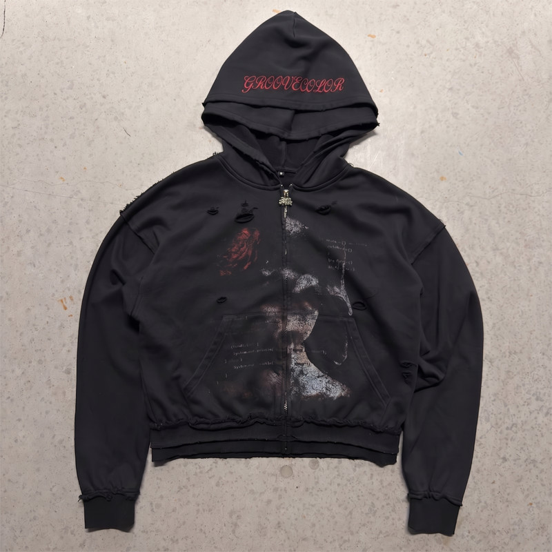 Black oversized streetwear hoodie featuring localized distressing and edge wear by Groovecolor.