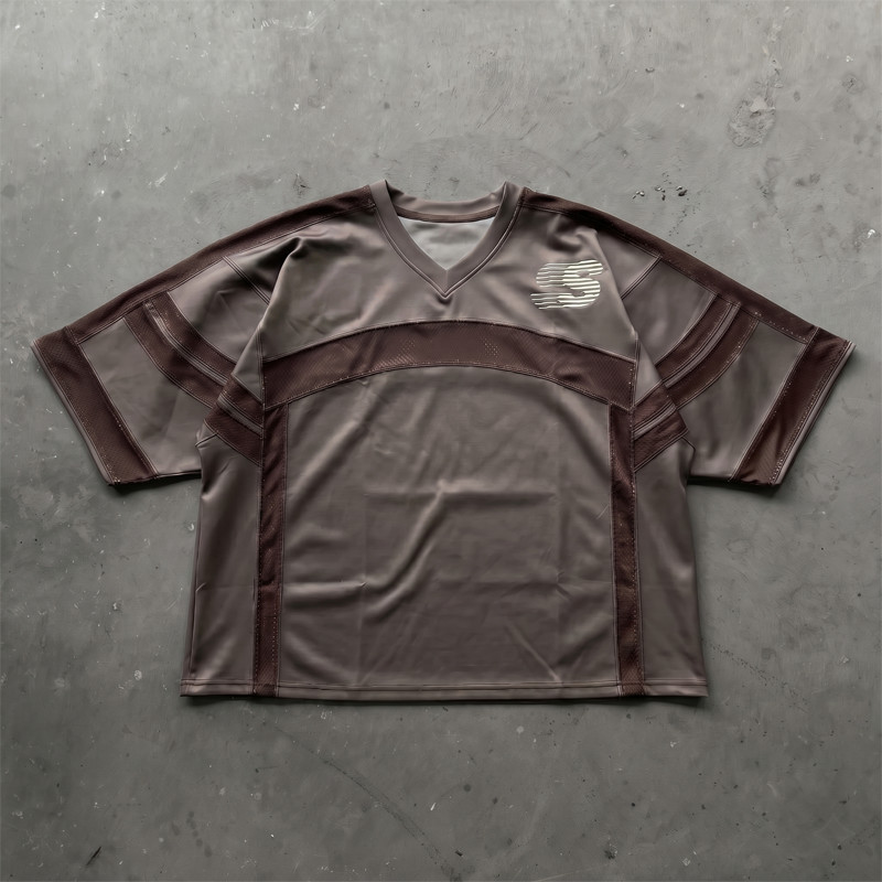 Front view of custom streetwear jersey tee showing precise mesh panel splicing by Groovecolor.