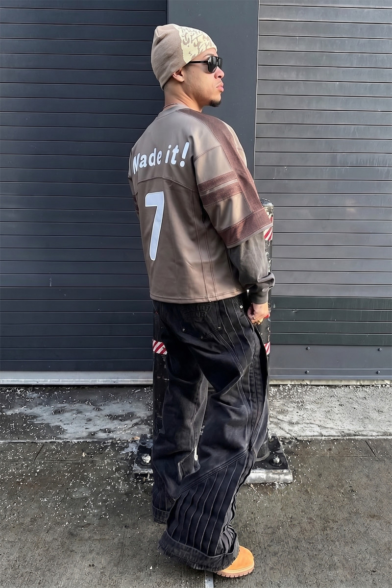 Back view of the custom mesh t-shirt showcasing multi-layer applique embroidery by Groovecolor.
