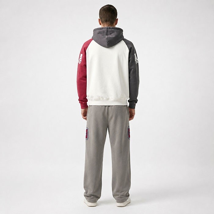 Back view OEM streetwear tracksuit with asymmetric hoodie panels and relaxed sweatpants