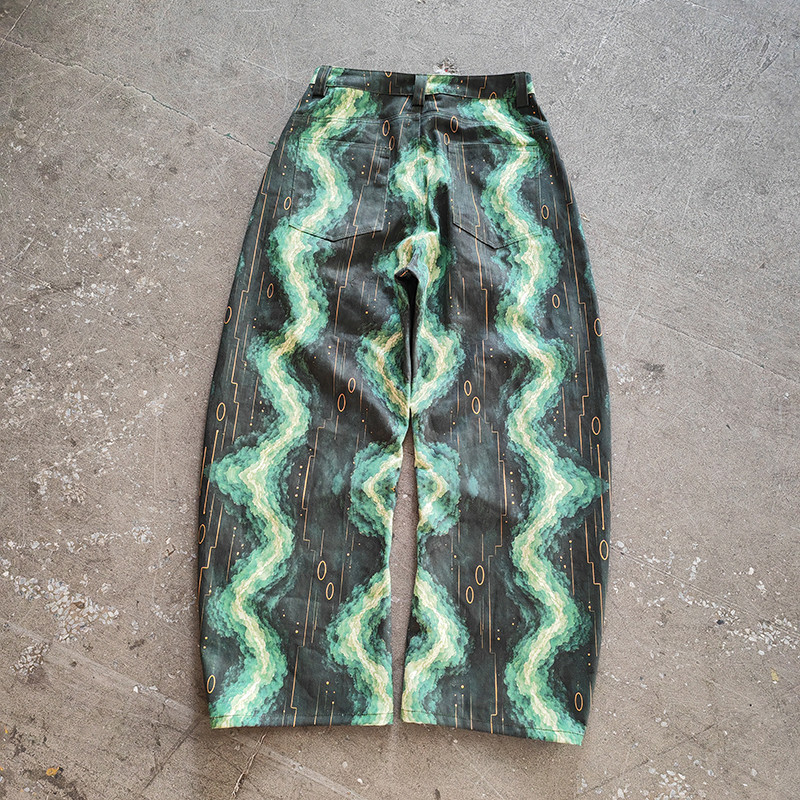 Flat‑lay view green wave all over print baggy jeans OEM streetwear denim sample