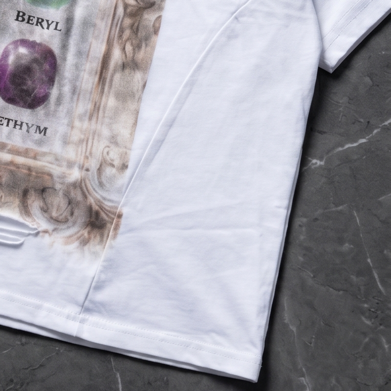 Detailed view of the custom underarm to hem cut-and-sew side panel on our streetwear tee, highlighting our advanced ODM pattern making and stitching.