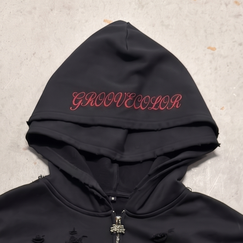 Double-layered hood construction featuring precision logo embroidery on the brim by Groovecolor.