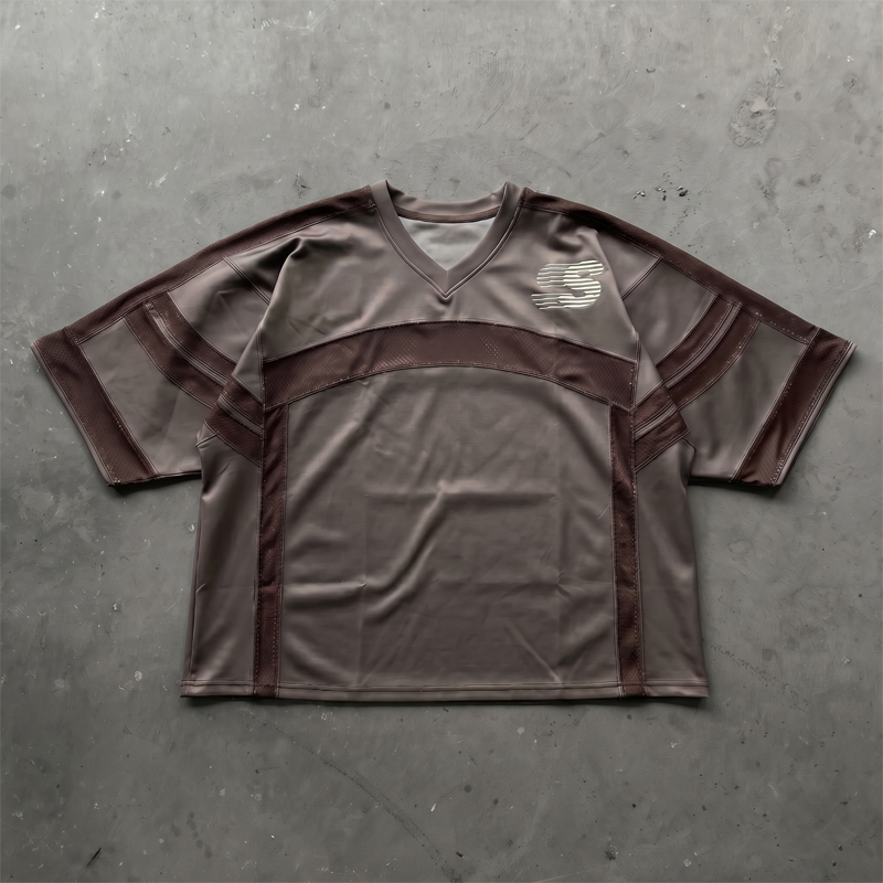 Front view of custom streetwear jersey tee showing precise mesh panel splicing by Groovecolor.