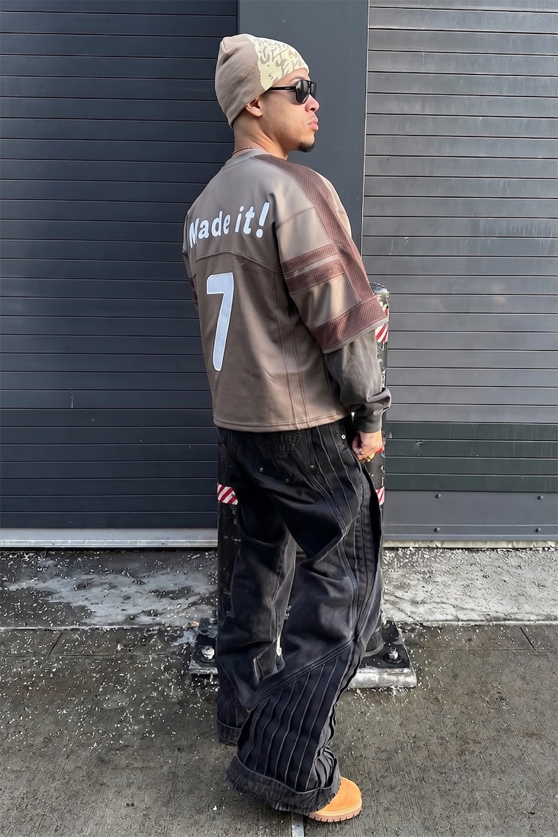 Back view of the custom mesh t-shirt showcasing multi-layer applique embroidery by Groovecolor.
