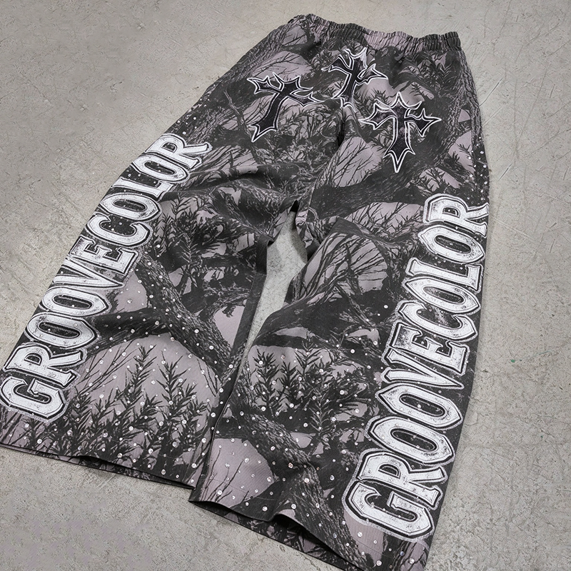 Streetwear collection styling reference for custom tree camo print cropped hoodie wide‑leg pants two‑piece OEM set