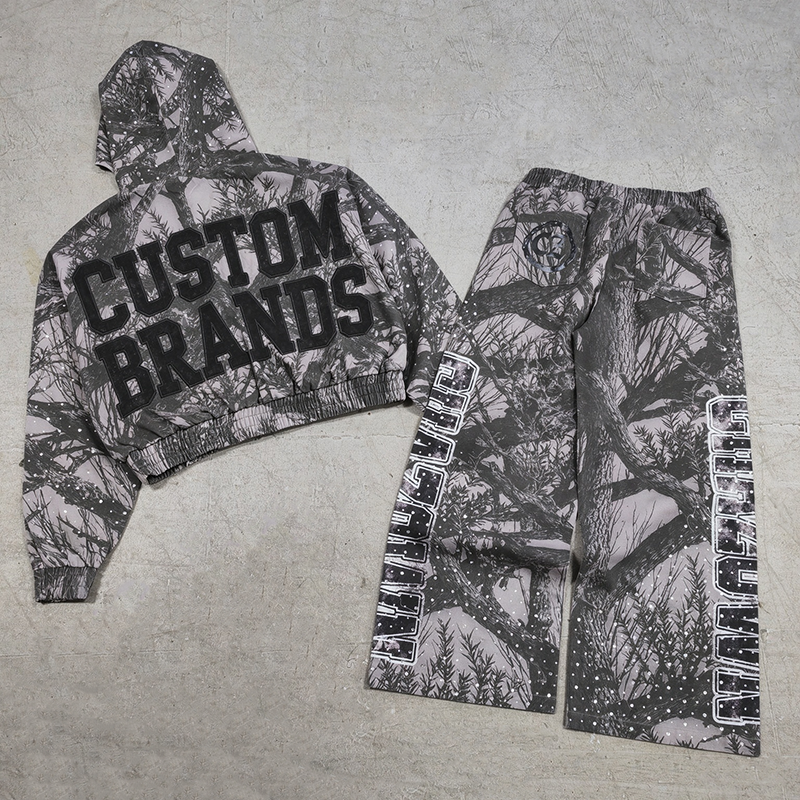 Flat‑lay full view custom tree camo print cropped hoodie wide‑leg pants OEM sample set