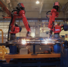 Automation Solution for Automotive Parts Welding Robots