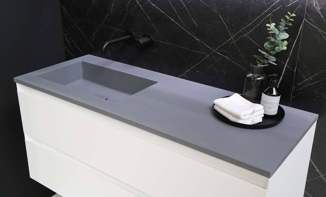 A uniquely shaped custom sink integrated into a countertop