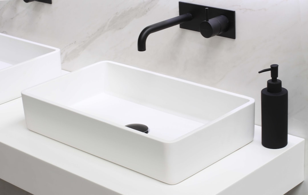 A versatile double bowl undermount sink with one side for washing and the other for rinsing