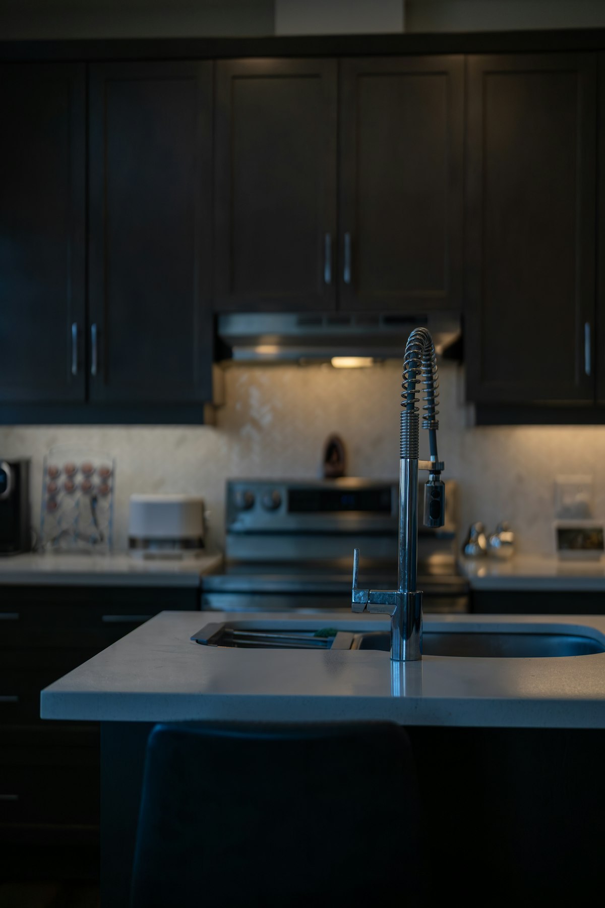 Modern kitchen island with sink and faucet