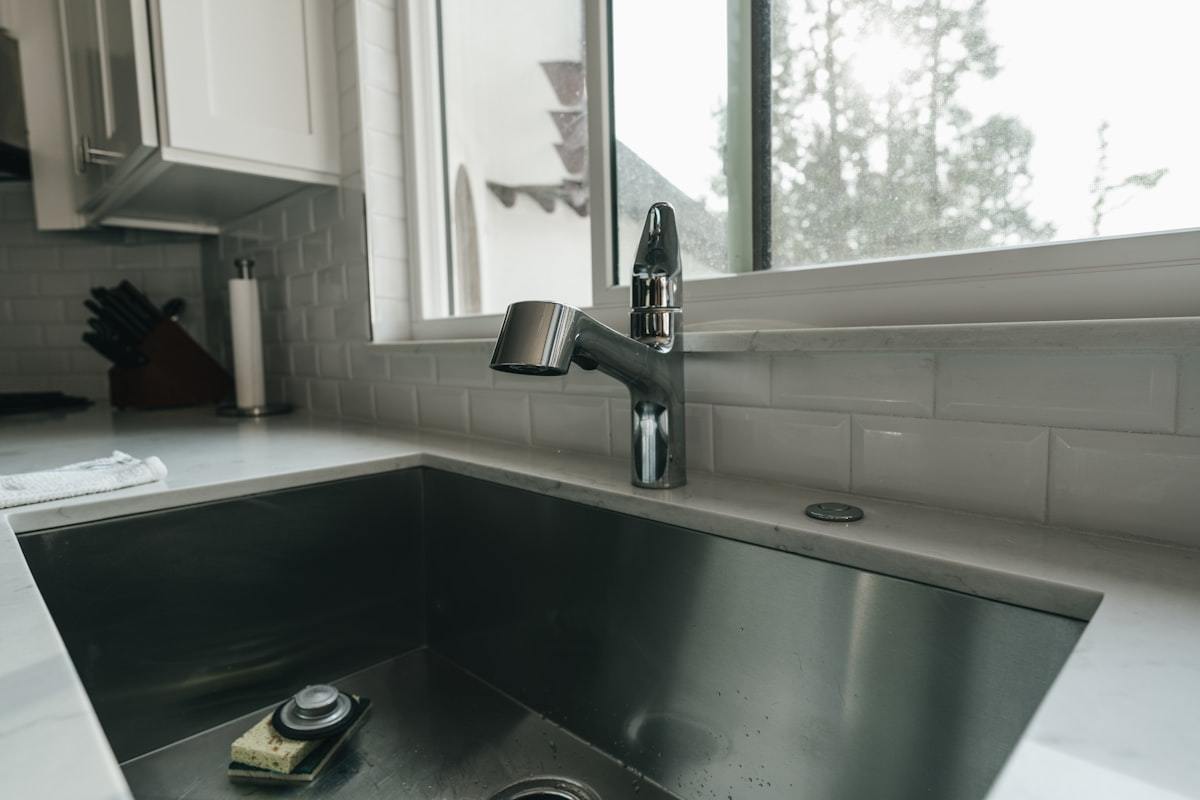 Kitchen with a sink and a window