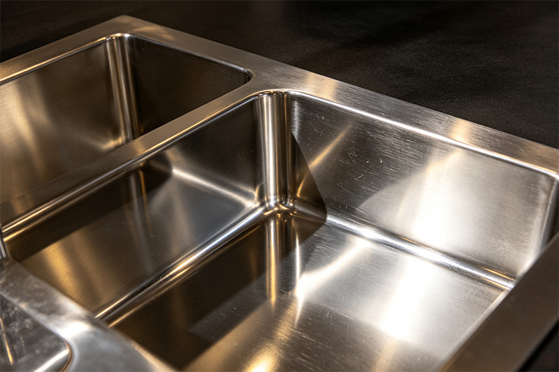 Modern Stainless Steel Sink Finishes Image showing a comparison of different stainless steel finishes, such as brushed, satin, and matte.