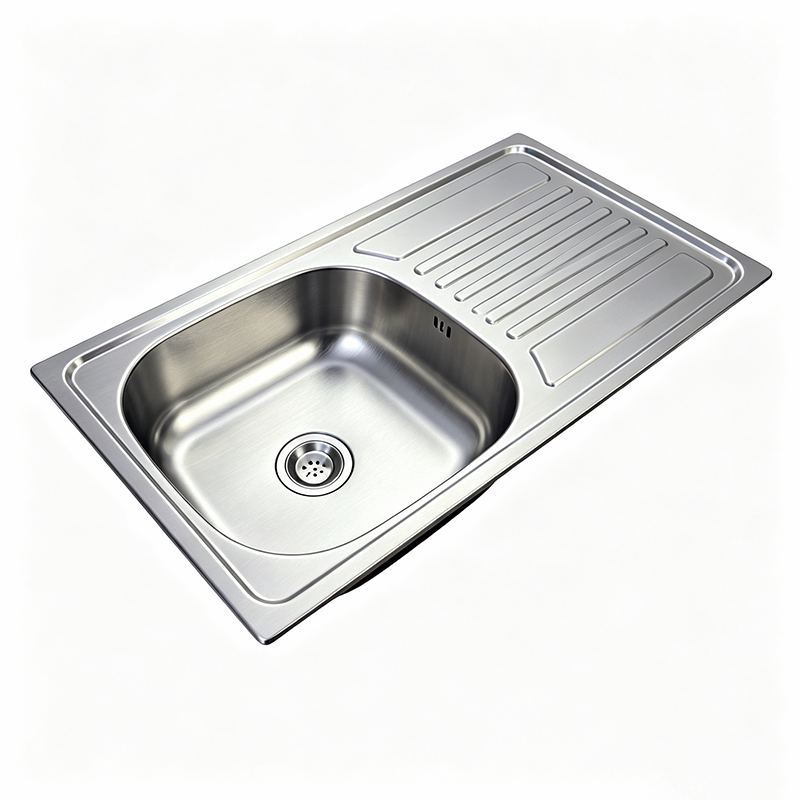 Angled side view of the single bowl sink with drainer board